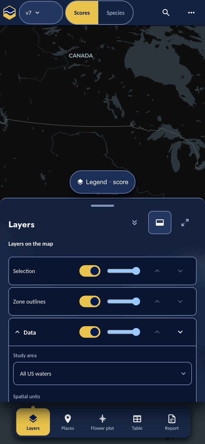 The Atlas on a phone: a thin top bar, the map, and a bottom sheet showing the Layers panel at half height above a bottom tab bar.